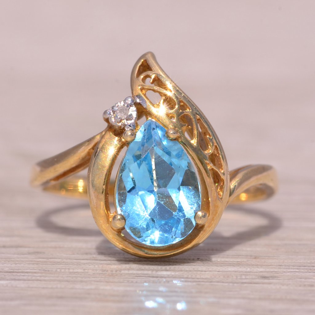 Vivid Swiss Blue Topaz And Natural Diamond Ring In Yellow Gold